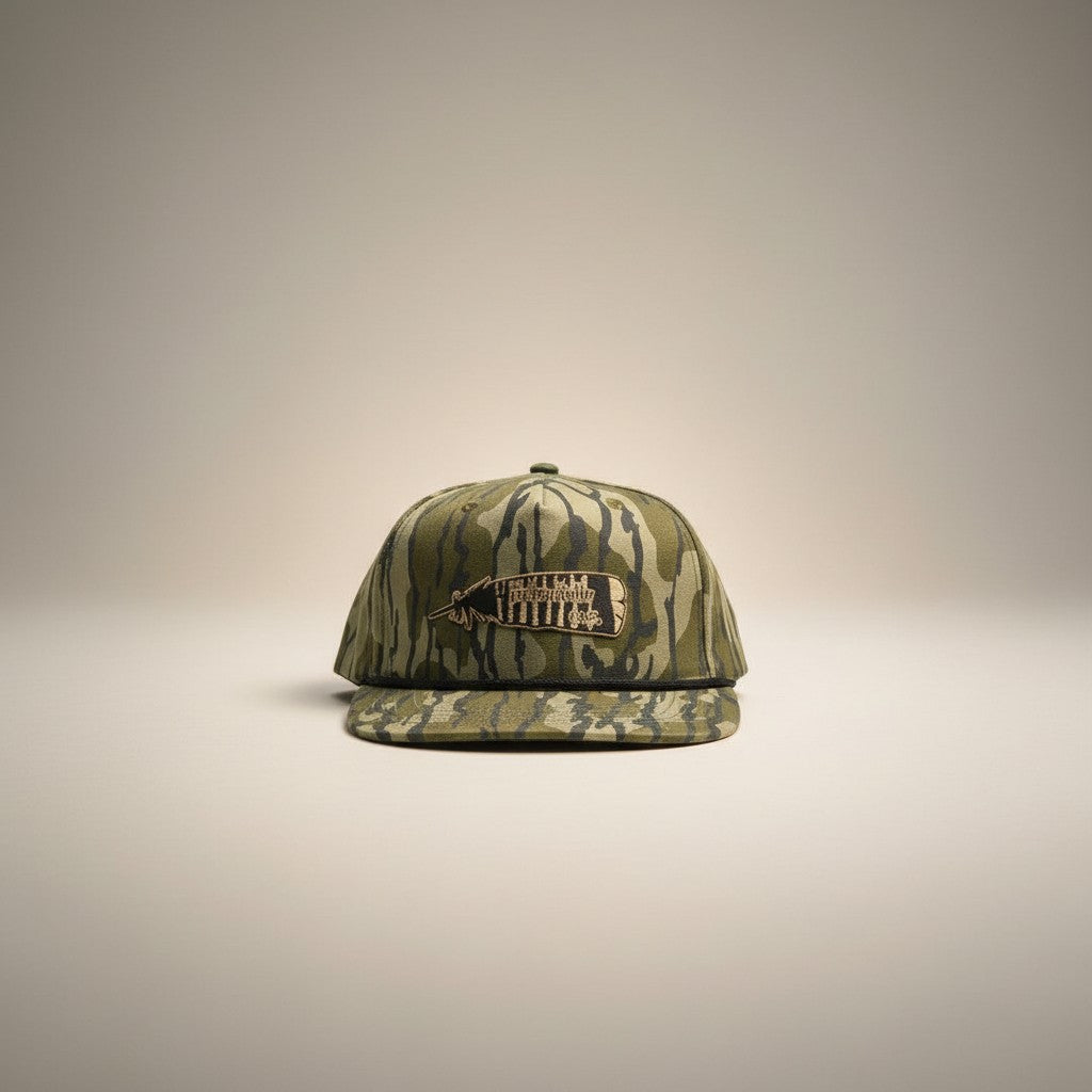 Broken Antler Hat Co. Mossy Oak camouflage snapback hat with adjustable strap and embroidered logo. Perfect for outdoor adventures.